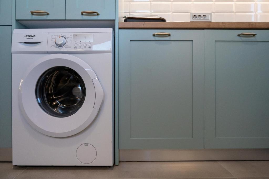 Washing machine and laundry facilities at Villa Akalli