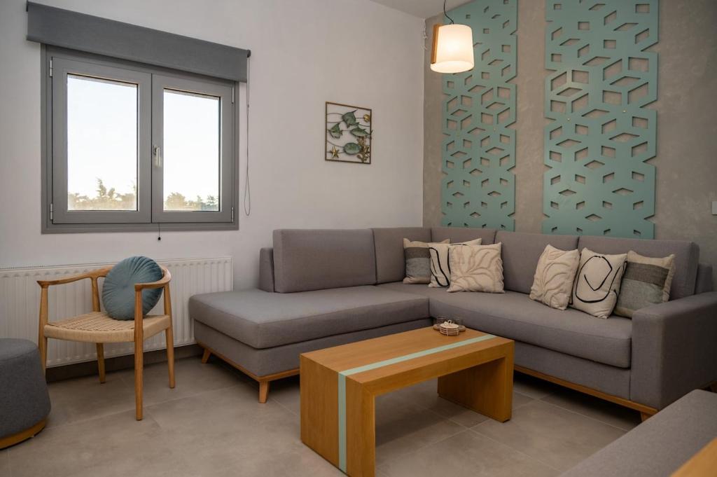 Villa Akalli comfortable living room with traditional Cretan decor and sea-facing windows